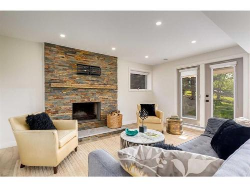 150 Elbow River Road, Rural Rocky View County, AB - Indoor Photo Showing Living Room With Fireplace