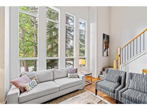 4-136 Silvertip Ridge, Canmore, AB - Indoor Photo Showing Living Room