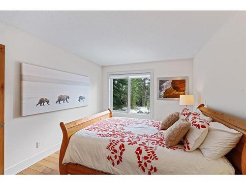 4-136 Silvertip Ridge, Canmore, AB - Indoor Photo Showing Bedroom