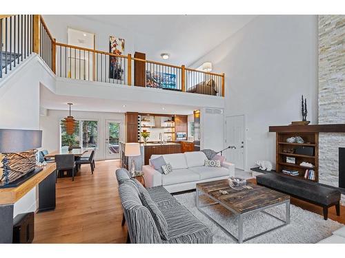 4-136 Silvertip Ridge, Canmore, AB - Indoor Photo Showing Living Room With Fireplace