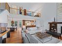 4-136 Silvertip Ridge, Canmore, AB  - Indoor Photo Showing Living Room With Fireplace 