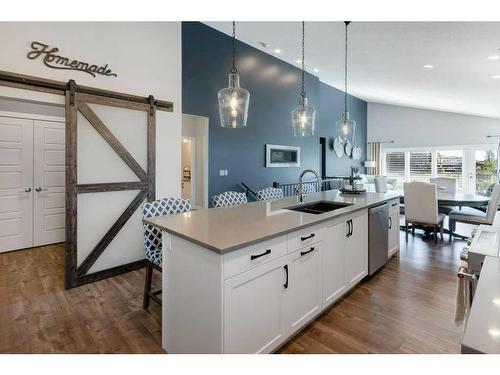 138 Bayview Circle Sw, Airdrie, AB - Indoor Photo Showing Kitchen With Double Sink