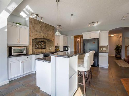 77 Royal Highland Road Nw, Calgary, AB - Indoor Photo Showing Kitchen With Upgraded Kitchen