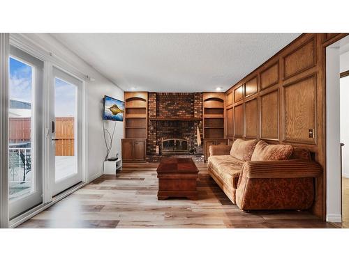 212 Templewood Road Ne, Calgary, AB - Indoor Photo Showing Other Room With Fireplace