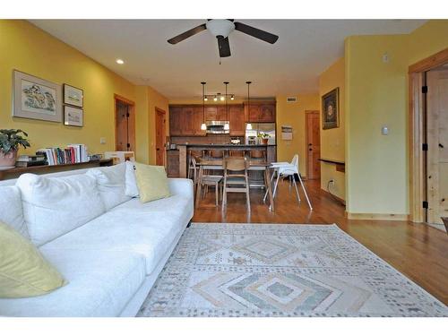 201-2100B Stewart Creek Drive, Canmore, AB - Indoor Photo Showing Living Room