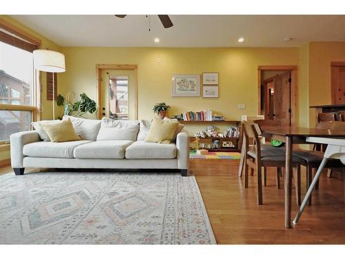 201-2100B Stewart Creek Drive, Canmore, AB - Indoor Photo Showing Living Room