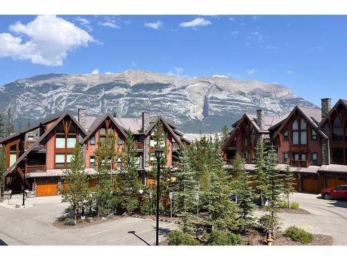 201-2100B Stewart Creek Drive, Canmore, AB - Outdoor With Facade