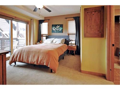 201-2100B Stewart Creek Drive, Canmore, AB - Indoor Photo Showing Bedroom