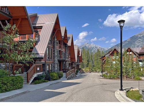 201-2100B Stewart Creek Drive, Canmore, AB - Outdoor With Facade