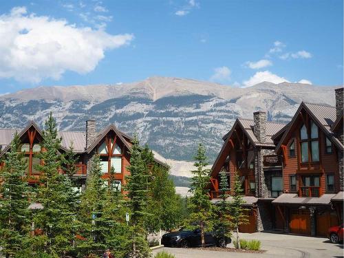 201-2100B Stewart Creek Drive, Canmore, AB - Outdoor With Facade