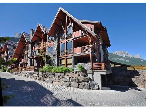 201-2100B Stewart Creek Drive, Canmore, AB - Outdoor With Facade