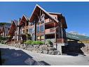 201-2100B Stewart Creek Drive, Canmore, AB  - Outdoor With Facade 