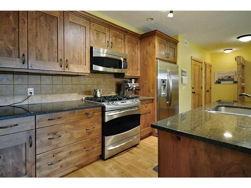 201-2100B Stewart Creek Drive, Canmore, AB - Indoor Photo Showing Kitchen