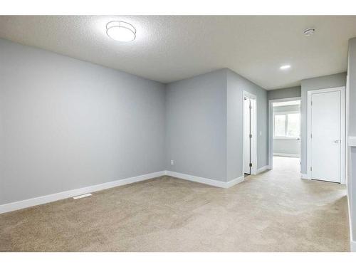 44 Key Cove Sw, Airdrie, AB - Indoor Photo Showing Other Room