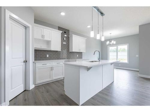 44 Key Cove Sw, Airdrie, AB - Indoor Photo Showing Kitchen With Upgraded Kitchen