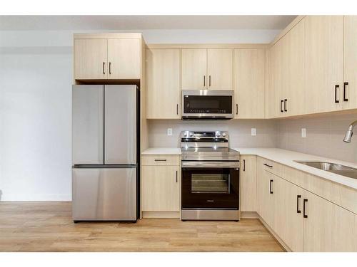 6213-200 Seton Circle Se, Calgary, AB - Indoor Photo Showing Kitchen With Stainless Steel Kitchen