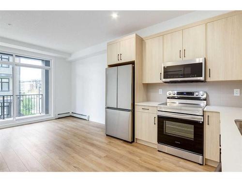 6213-200 Seton Circle Se, Calgary, AB - Indoor Photo Showing Kitchen