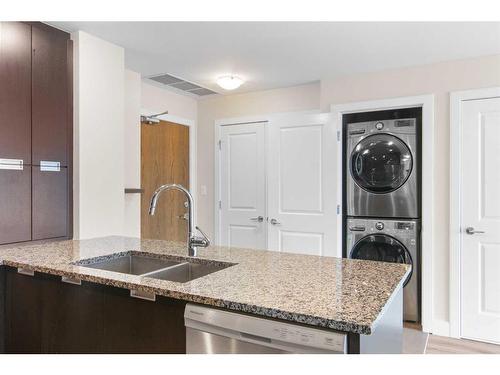 2207-99 Spruce Place Sw, Calgary, AB - Indoor Photo Showing Kitchen With Double Sink