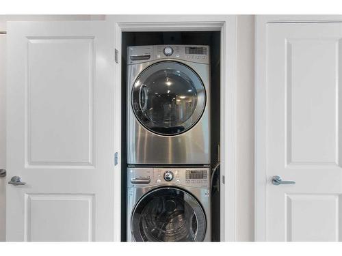 2207-99 Spruce Place Sw, Calgary, AB - Indoor Photo Showing Laundry Room