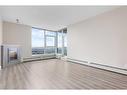 2207-99 Spruce Place Sw, Calgary, AB  - Indoor With Fireplace 