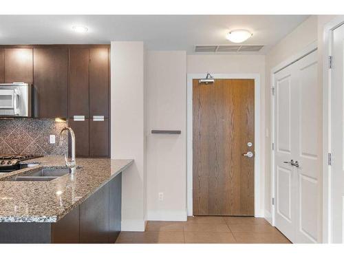 2207-99 Spruce Place Sw, Calgary, AB - Indoor Photo Showing Kitchen With Double Sink