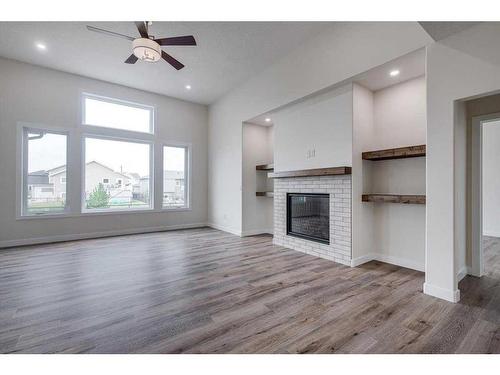 6 Harrison Green, Olds, AB - Indoor Photo Showing Living Room With Fireplace