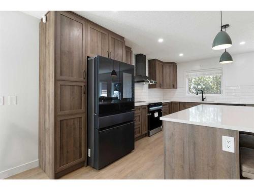 70 Dobler Avenue, Red Deer, AB - Indoor Photo Showing Kitchen With Upgraded Kitchen