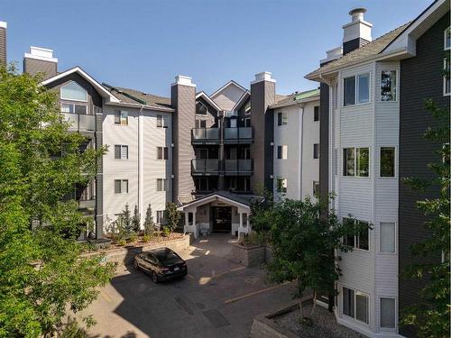 206-30 Sierra Morena Mews Sw, Calgary, AB - Outdoor With Balcony With Facade