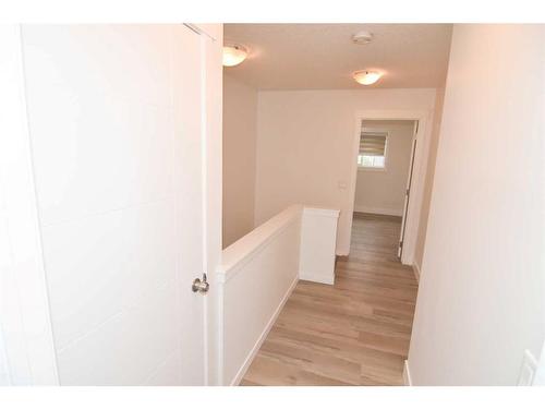 45-248 Kinniburgh Boulevard, Chestermere, AB - Indoor Photo Showing Other Room