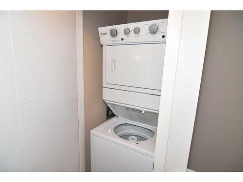 45-248 Kinniburgh Boulevard, Chestermere, AB - Indoor Photo Showing Laundry Room