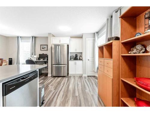 1003 Cranbrook Walk Se, Calgary, AB - Indoor Photo Showing Kitchen With Stainless Steel Kitchen