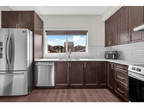 679 Cornerstone Way Ne, Calgary, AB - Indoor Photo Showing Kitchen With Double Sink