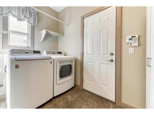 63 Discovery Ridge Circle Sw, Calgary, AB - Indoor Photo Showing Laundry Room