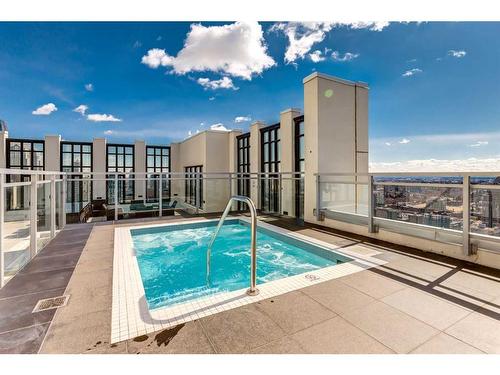 1008-901 10 Avenue Sw, Calgary, AB - Outdoor With In Ground Pool