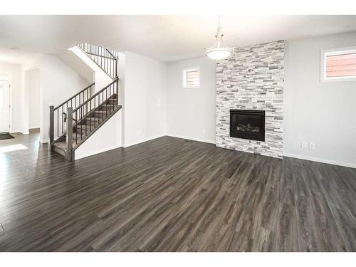 342 Yorkville Road Sw, Calgary, AB - Indoor Photo Showing Living Room With Fireplace