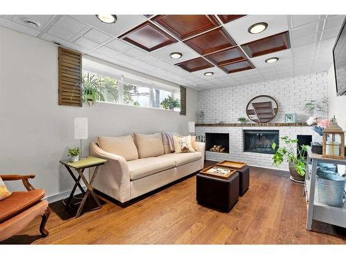 1309 Mcalpine Street, Carstairs, AB - Indoor Photo Showing Living Room With Fireplace