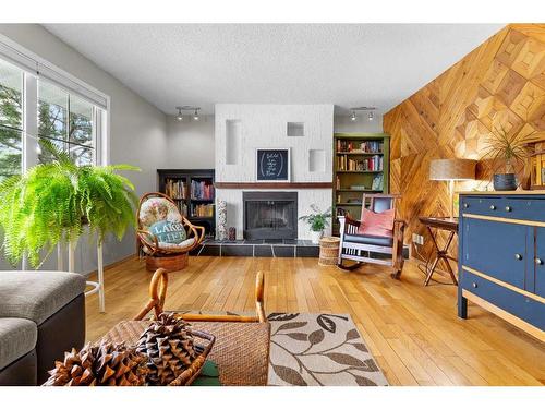 1309 Mcalpine Street, Carstairs, AB - Indoor Photo Showing Living Room With Fireplace