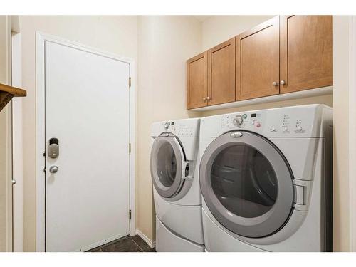 23 Rockyspring Rise Nw, Calgary, AB - Indoor Photo Showing Laundry Room