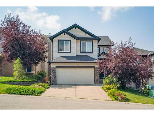 23 Rockyspring Rise Nw, Calgary, AB - Outdoor With Facade