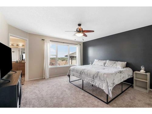 23 Rockyspring Rise Nw, Calgary, AB - Indoor Photo Showing Bedroom