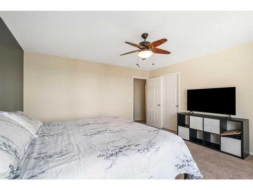 23 Rockyspring Rise Nw, Calgary, AB - Indoor Photo Showing Bedroom