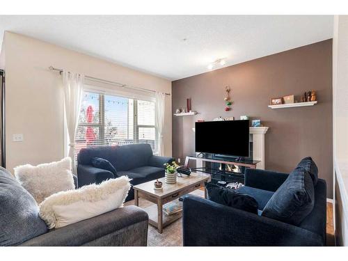 23 Rockyspring Rise Nw, Calgary, AB - Indoor Photo Showing Living Room