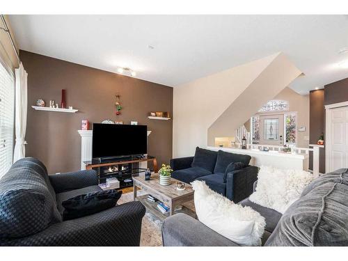 23 Rockyspring Rise Nw, Calgary, AB - Indoor Photo Showing Living Room