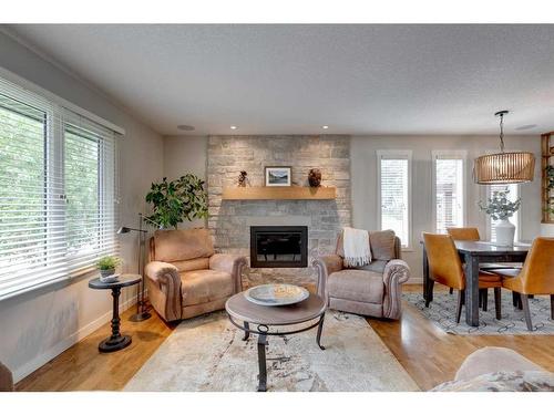 7356 Silver Mead Road Nw, Calgary, AB - Indoor Photo Showing Living Room With Fireplace