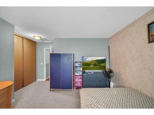 19 Appletree Close Se, Calgary, AB - Indoor Photo Showing Bedroom