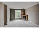 334-5201 Dalhousie Drive Nw, Calgary, AB  - Indoor With Fireplace 