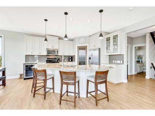 152 Drake Landing Terrace, Okotoks, AB - Indoor Photo Showing Kitchen With Upgraded Kitchen