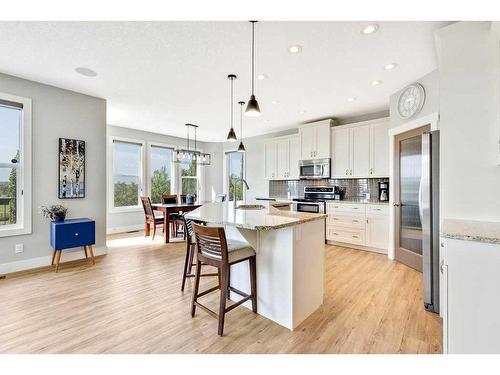 152 Drake Landing Terrace, Okotoks, AB - Indoor Photo Showing Kitchen With Upgraded Kitchen