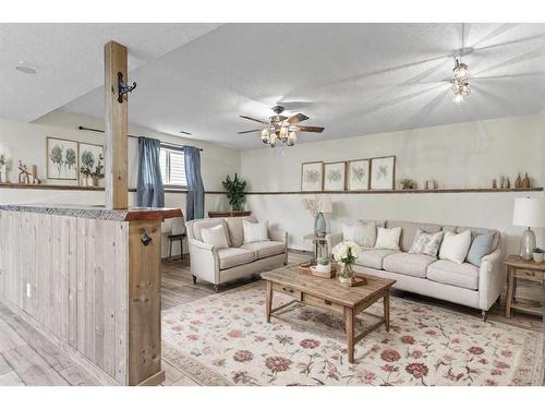 534 Country Meadows Way Nw, Diamond Valley, AB - Indoor Photo Showing Living Room