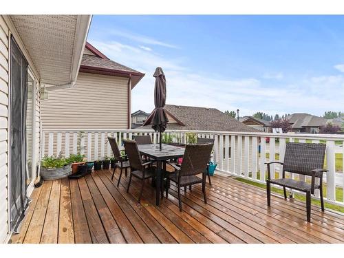 534 Country Meadows Way Nw, Diamond Valley, AB - Outdoor With Deck Patio Veranda With Exterior